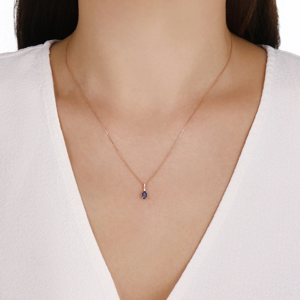 0.25 Karat Oval Safir Baget Kolye